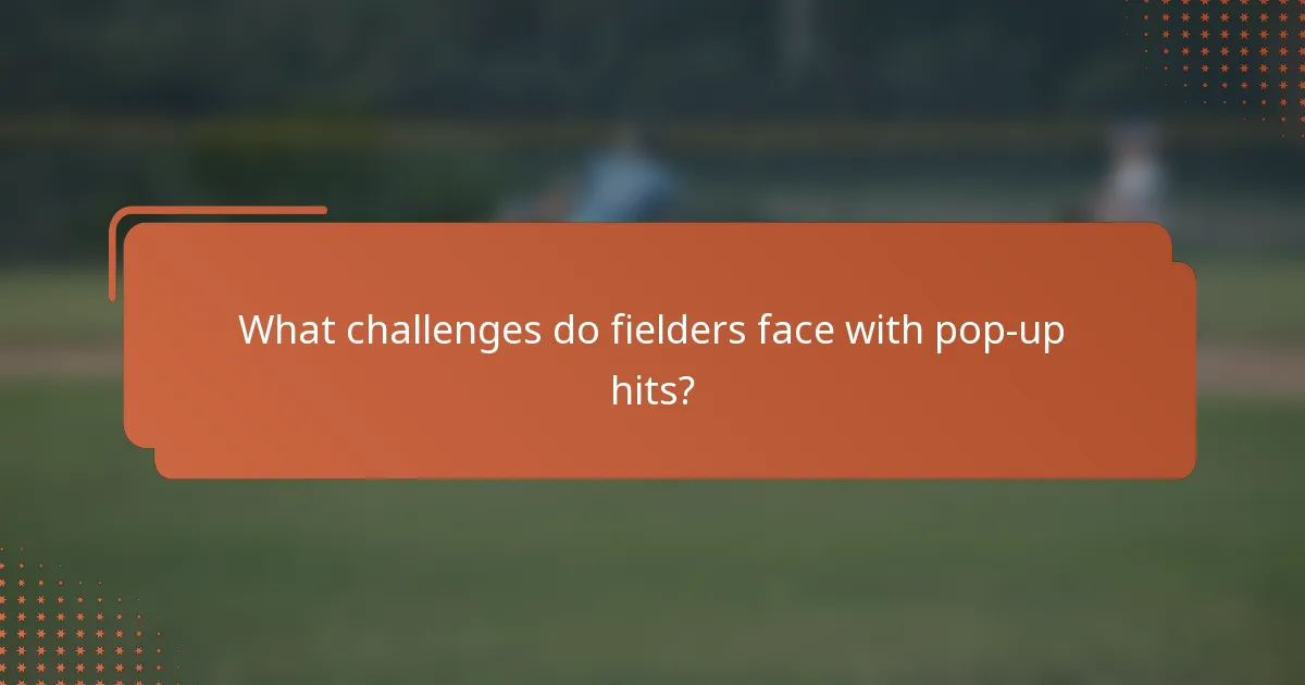 What challenges do fielders face with pop-up hits?